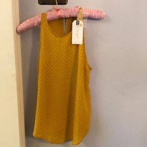 Day to Day, mustard yellow polyester tank with white polka dots.Small